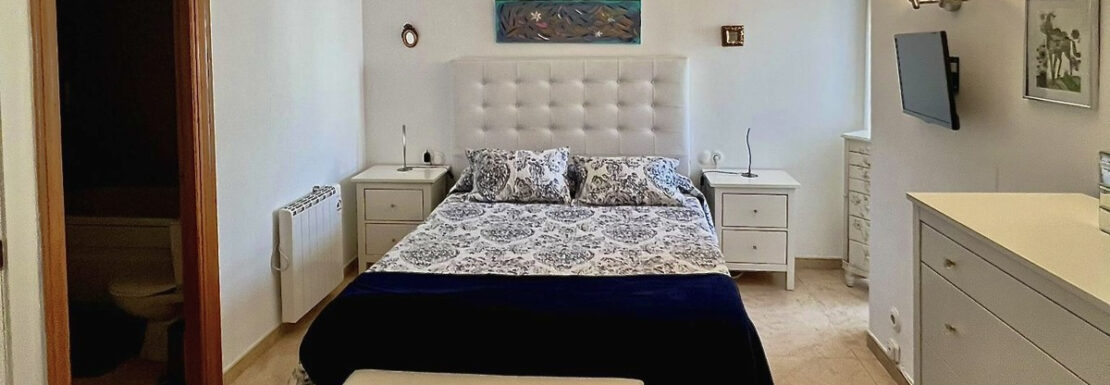 Schlafzimmer mit Bad en suite