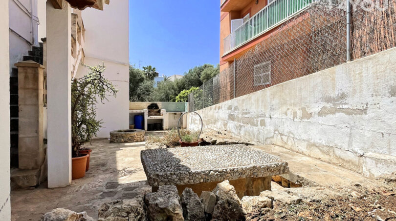 Terraza con cocina exterior