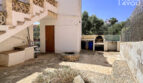 Terraza con cocina exterior