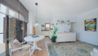 Living room with americ. kitchen