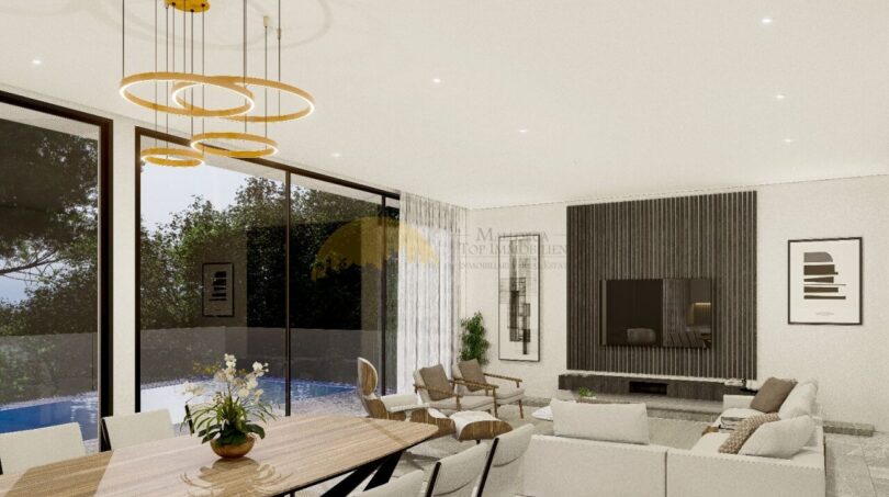 Modernes Wohnzimmer der Neubauvilla in Calvià mit Esstisch, Lounge und Poolblick durch Panoramafenster.