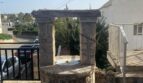 Historischer Steinbrunnen im Außenbereich des Zweifamilienhauses in Portocolom mit Meerblick