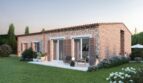 Vista exterior de la nueva Finca Manacor: Villa de piedra natural con terraza, persianas de madera y jardín bien cuidado de estilo mediterráneo.