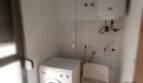 Hauswirtschaftsraum mit Waschmaschine und Warmwasserbereiter in Maisonette-Wohnung, El Molinar-Portitxol