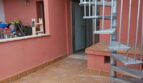 Außenterrasse mit Terrakottafliesen und Wendeltreppe der Maisonette-Wohnung in El Molinar-Portitxol, Palma