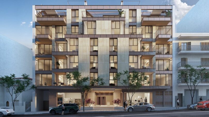 Modern apartment building in Palma with balconies, roof terrace and commercial space on the ground floor.
