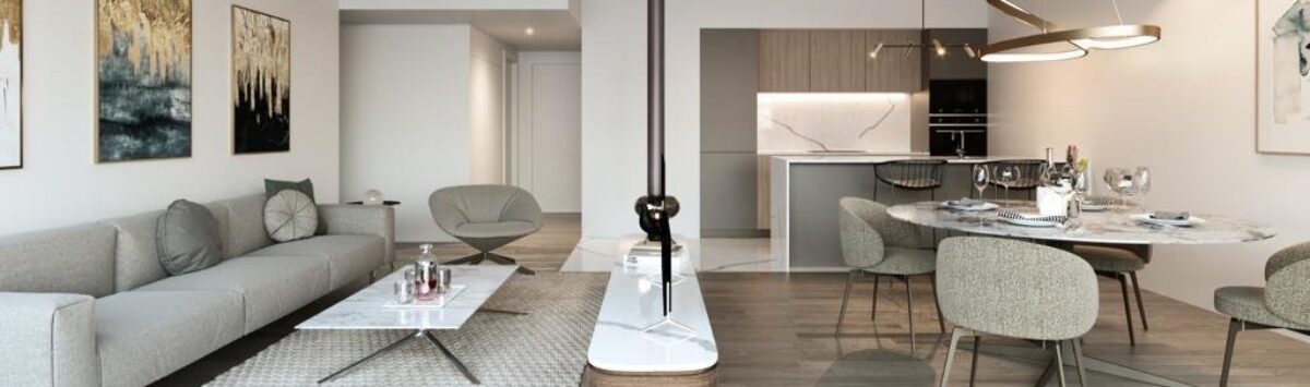 Open living and dining area with modern kitchen, fireplace and elegant furnishings in luxury apartment Palma