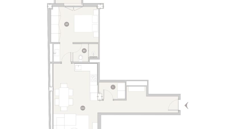 Grundriss eines Luxusapartments in Palma mit Wohnbereich, Schlafzimmer, Bad und Küche in L-Form.
