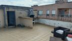 Großzügige Dachterrasse mit Grillstation, Sitzbereich und Stadtblick in Palma Son Cladera