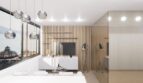 Modernes Wohnzimmer im Loft mit Holzlatten-TV-Wand, Pendelleuchten und Meerblick über Palma de Mallorca