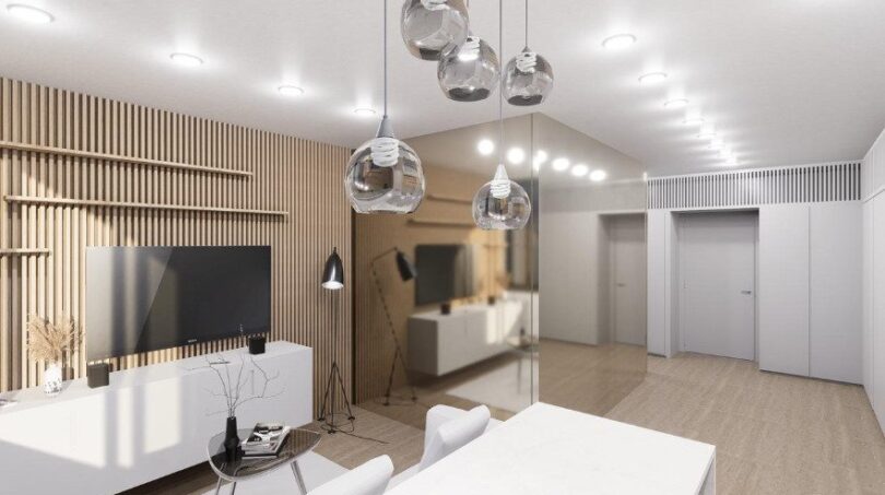 Modernes Wohnzimmer mit Holzlamellenverkleidung, TV-Einheit und eleganten Glaskugellampen im Loft Palma