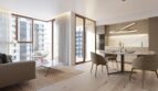 Lichtdurchfluteter Wohn-Essbereich mit Marmorisch, moderner Küche und Balkon in exklusiver Palma-Wohnung