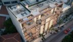 Luftansicht eines modernen Luxus-Apartmentgebäudes in Palma mit großzügigen Terrassen und Rooftop-Lounge.