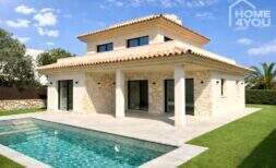 Exclusiva villa de nueva construcción en Cala Llombards con 3 dormitorios, 3 baños, piscina, vistas al mar, aire acondicionado y calefacción por suelo radiante.