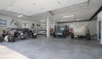 Geräumige Garage mit Oldtimern, Motorrädern und Werkstattbereich im exklusiven Einfamilienhaus in Palma