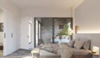 Helles Schlafzimmer mit Doppelbett, Natursteinboden und Glasschiebetür zum mediterranen Innenhof der Finca in Artà.