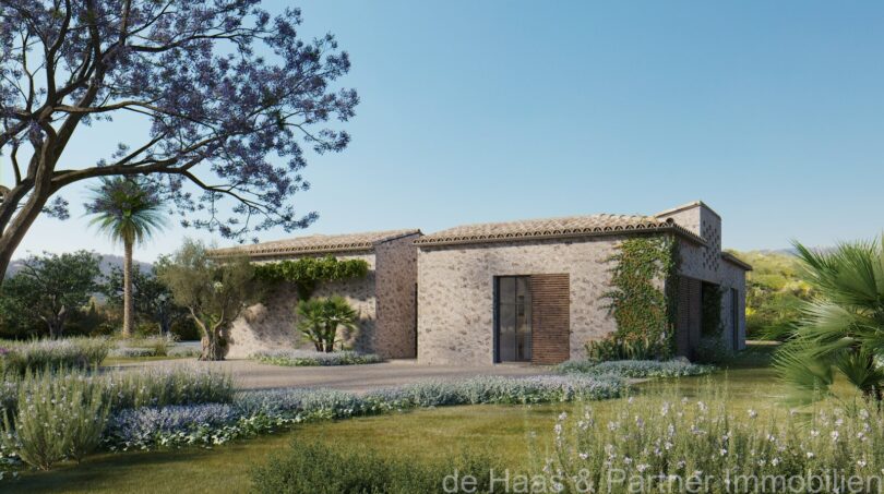 Neubau-Finca Artà: Rustikale Naturstein-Villa mit mediterranem Garten, Palmen und üppiger Bepflanzung.