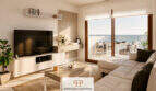 Helles Wohnzimmer des Penthouses in Canyamel mit Meerblick-Terrasse, modernem TV-Bereich und Ecksofa.