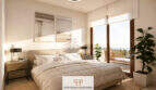 Helles Schlafzimmer im Penthouse Canyamel mit Doppelbett, Meerblick-Balkon und modernem Design