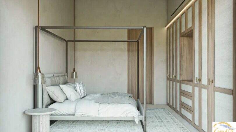 Elegante dormitorio con cama con dosel, armario empotrado de madera y un toque mediterráneo en la exclusiva finca de Artà