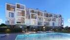 Exterior view: Modern new construction in Palmanova with pool, balconies and wood elements in evening light, within walking distance to the beach.