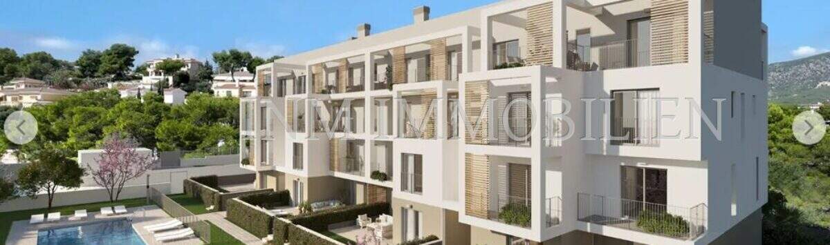 Exterior view of modern new residential complex in Palmanova with pool, terraces and lush greenery, close to the beach.