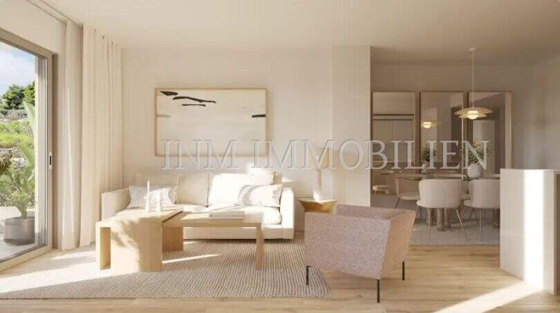 Bright living room of a new apartment in Palmanova with modern design, wooden floor and large glass front to the balcony.