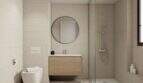 Modernes Badezimmer mit Walk-in-Dusche, Holzwaschtisch & Rundspiegel in Erdgeschoss-Wohnung Porto Cristo
