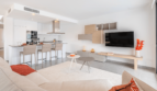 Open Living-Dining Area with Modern Kitchen, TV Wall and Terrace Access in Semi-Detached House Cala Ratjada