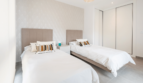 Bright Bedroom with Two Single Beds, Beige Upholstered Headboards and Large Built-In Wardrobe in Semi-Detached House Cala Ratjada