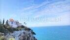 Doppelhaushälfte auf Meeresklippe in Badia Blava mit Panoramablick auf türkisblaues Mittelmeer