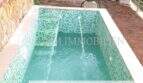 Privater Pool mit Mosaikfliesen und Wasserjet-Düsen der Doppelhaushälfte in Badia Blava, Llucmajor