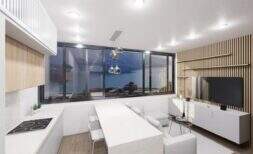 Modern residential loft in Palma with open kitchen, wood accents and panoramic windows with sea view