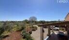 Spacious finca terrace with olive trees, gravel path and mountain views near Felanitx, Mallorca