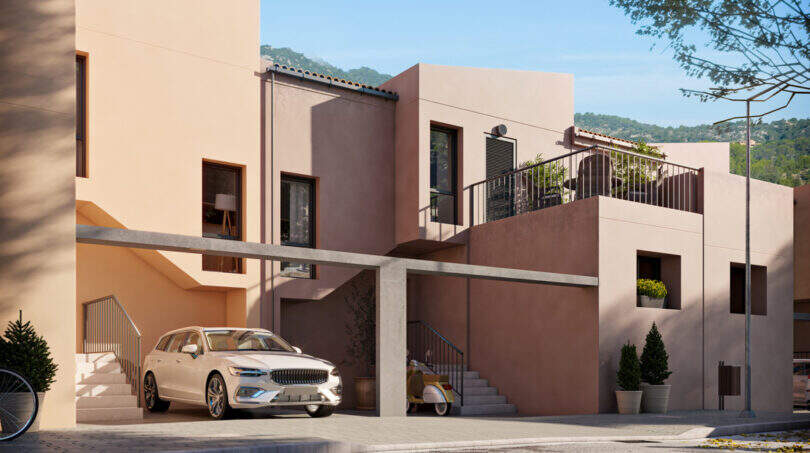 Außenansicht Reihenhaus Esporles: Terrakottafassade, Dachterrasse, überdachter Stellplatz, Tramuntana-Gebirge im Hintergrund