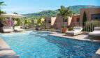 Pool mit Liegestühlen und Palmen, Reihenhaus in Esporles am Fuße des Tramuntana-Gebirges