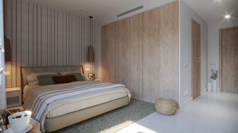 Helles Schlafzimmer mit Doppelbett, Holzvertäfelung und modernem Design im Reihenhaus Esporles