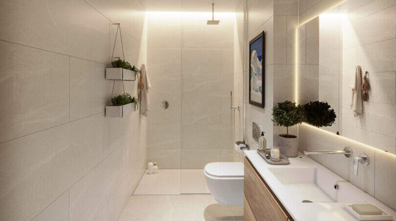 Modernes Badezimmer mit Doppelwaschbecken, begehbarer Dusche und indirekter Beleuchtung im Reihenhaus Esporles