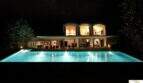 Moderne Finca Felanitx bei Nacht: beleuchteter Infinity-Pool, großzügige Bögen & Stargazing-Himmel