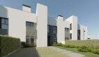 Moderne Neubau-Chalets in Palma mit weißer Fassade, Flachdach und gepflegtem Garten mit Hecken.