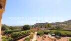 Well-maintained garden with panoramic view of mountains and sea in Son Servera, Mallorca
