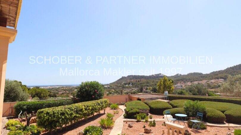 Well-maintained garden with panoramic view of mountains and sea in Son Servera, Mallorca