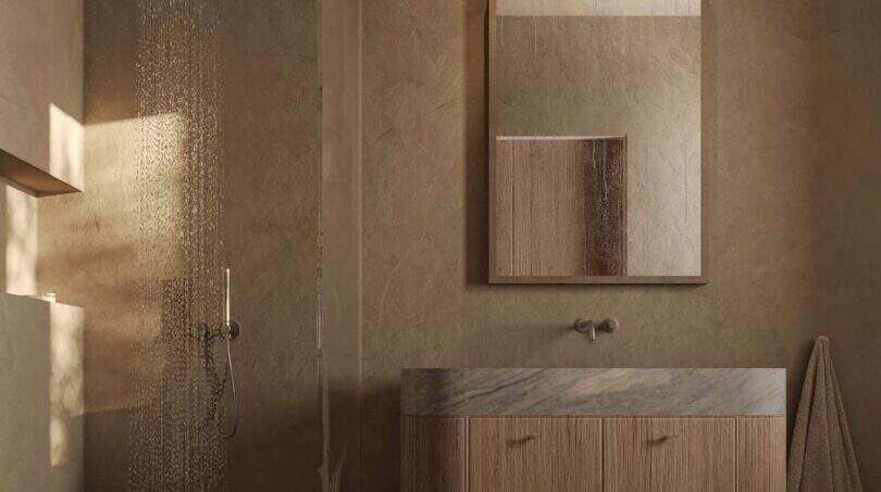 Luxus-Badezimmer der Designer-Villa Santanyí mit Regendusche, Holzwaschtisch und Marmor in warmen Erdtönen.