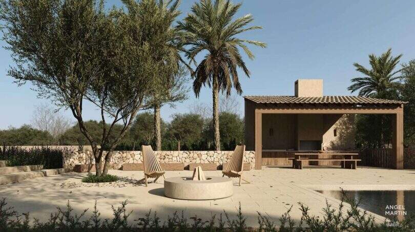 Mediterraner Außenbereich der Designer-Villa in Santanyí mit Feuerstelle, Holzstühlen und überdachtem Grillbereich.