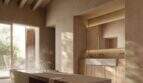 Luxusbad der Designer-Villa Santanyí mit Steinwänden, Holzdecke, freistehender Wanne und elegantem Waschtisch