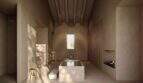 Rustikales Badezimmer der Designer-Villa Santanyí mit Naturstein, Freistehbadewanne und Kamin