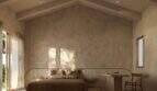 Schlafzimmer der Designer-Villa Santanyí mit Gewölbedecke, Naturputzwänden und elegantem Doppelbett