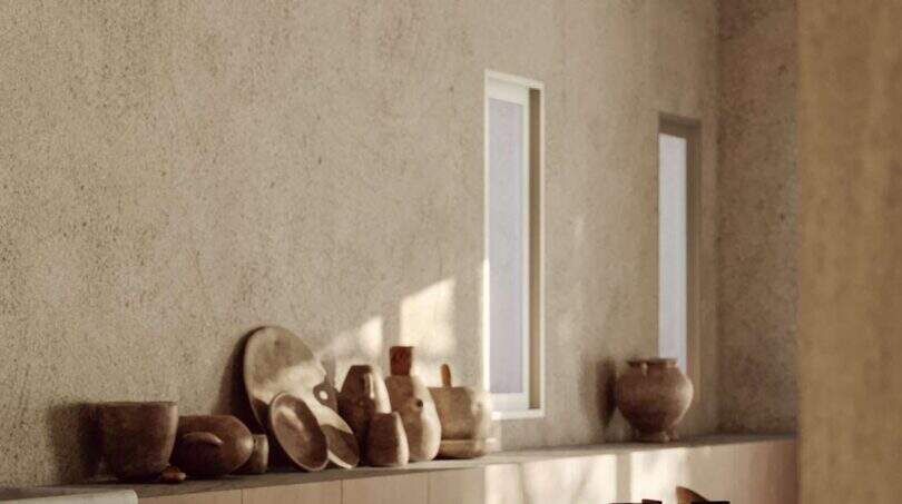 Mediterrane Küche der Designer-Villa Santanyí mit Steinwänden, Holzbalken und handgefertigter Keramik