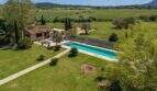 Aerial view of the Felanitx finca with pool, well-maintained garden, stone house and expansive landscape