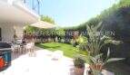 Sonnige Terrasse mit Markise, Grillbereich und gepflegtem Privatgarten in Garten-Eck-Wohnung Sa Coma